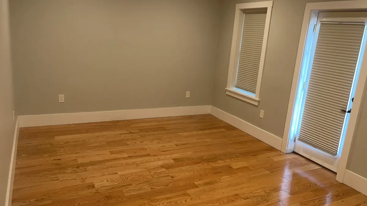 The same bedroom cleared and swept after the cleanout